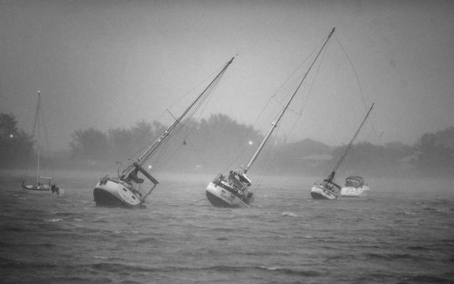 Sail boats anchored in Roberts Bay are blown around by 50 mph winds in Venice, Florida, as Hurricane Ian, a Category 5 Hurricane, approaches the West Coast of Florida, on Wednesday, Sept. 28, 2022. (Pedro Portal/ El Nuevo Herald/TNS)