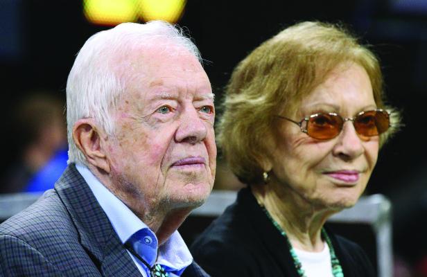 Former president Jimmy Carter and first lady Rosalynn Carter are on the sidelines for the Falcons and Bengals in a NFL football game on Sept 30, 2018, in Atlanta. (Curtis Compton/The Atlanta Journal-Constitution/TNS)