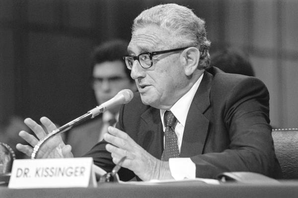 Former Secretary of State Henry Kissinger responds to opening statements by members of the Senate POW/MIA committee before making his own opening statement on Sept. 22, 1992, in Washington. D.C. (Robert Giroux/AFP/Getty Images/TNS)