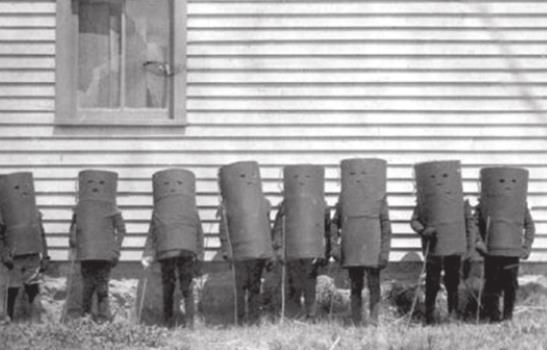 We’re not really sure exactly what these kiddos are dressed up as, but they’re creepy. Garbage cans? Dynamite? Fire crackers? Ball of twine? Who knows. We do know that we’d be terrified if we saw them coming down a dark street, intent to cause mischief! Kansas Historical Society | Courtesy Photo