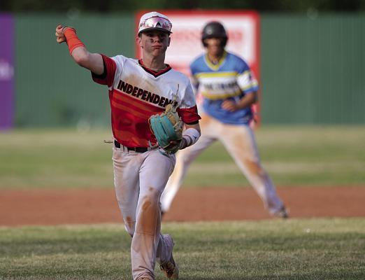 Bulldogs sophomore shortstop Spencer Crain makes a heads-up play with a throw to home to prevent a run in the top of the sixth inning of IHS's home loss to Parsons on Monday, April 22. Nick Dailey | Staff Photo