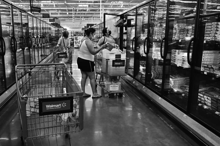 People shop for frozen food at a store in Rosemead, California, on June 28, 2022. (Frederic J. Brown/ AFP via Getty Images/TNS)