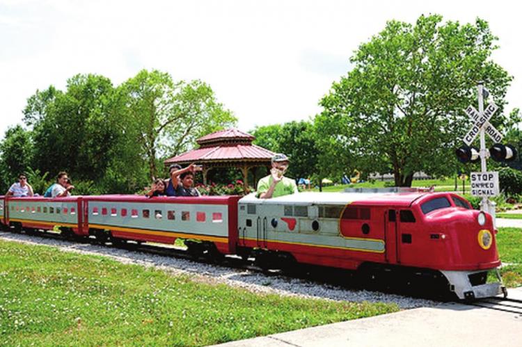 ALL ABOARD — Park goers enjoy train rides, pictured, along with mini-golf and carousel rides at Riverside Park on Saturday, June 20. Joshua Meadows | Courtesy Photo