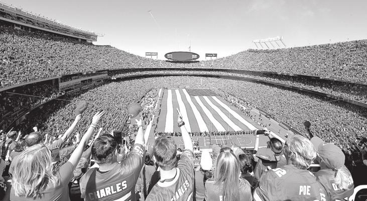 Kansas City Chiefs fans salute at the end of the National Anthem as a B2 stealth bomber and fireworks fly overhead before Sunday’s football game against the San Diego Chargers on Sunday, Sept. 11, 2016 at Arrowhead Stadium in Kansas City, Mo. John Sleezer | Kansas City Star | TNS