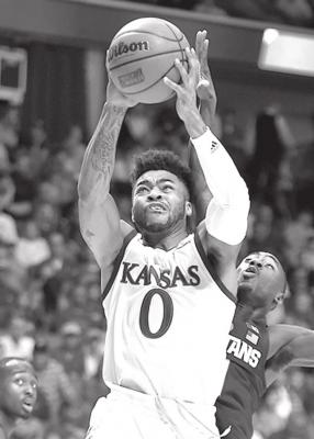Kansas’ Frank Mason (0) drives for a bucket against Michigan State during the second round of the NCAA Tournament on March 19, 2017, at the BOK Center in Tulsa, Oklahoma. Rich Sugg | Kansas City Star | TNS