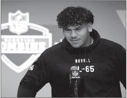 Kingsley Suamataia (OL65) of the Brigham Young Cougars speaks to the media during the 2024 NFL Combine at the Indiana Convention Center on March 2, 2024, in Indianapolis. Justin Casterline | Getty Images | TNS