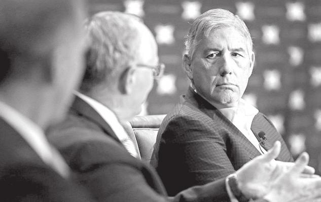 Bob Bowlsby, Commissioner of Big 12 Conference, right, listens to Gene Taylor, Director of Athletics of Kansas State University, center, during a panel discussion on eSports at the Big 12 Conference’s state of college athletics forum at Statler Hotel in Dallas, May 23, 2018. Jae S. Lee | Dallas Morning News | TNS