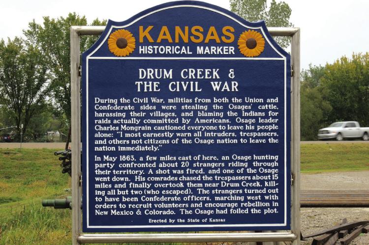BEGINNING THE TOUR — First stop on the Kansas Historical Marker Tour: The bright blue metal sign that commemorates the events that happened at nearby Drum Creek during the Civil War. This marker stands on the east side of Independence as you head down Highway 160. Historical Marker Database | Courtesy Photo